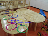 幼儿园椭圆拼桌橡木桌椅儿童幼儿园多功能拼桌带脚套防滑实木桌椅