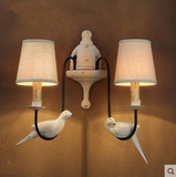 设计师的灯欧式壁灯复古创意美式床头灯阳台温馨客厅双头小鸟壁灯