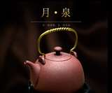 台湾建窑功夫茶具月泉陶壶电陶炉专用煮茶壶烧水壶竹提梁陶瓷茶壶