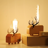 装饰台灯现代简约创意原创小鹿造型节能灯书房客房卧室木质送灯泡
