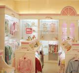 烤漆童装展示柜母婴用品展示架儿童服饰货架欧式陈列柜服装中岛