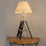 设计师的灯三脚架实木创意美式北欧风情后现代台灯简欧纯铜台灯