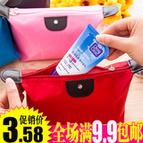 韩版简约时尚女生手拿水饺子化妆包收纳手提包旅行便携小号洗漱包