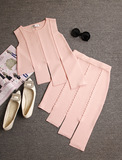 出口日本VIVI杂志款名媛风粉色无袖针织衫高腰不规则针织短裙套装
