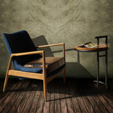 北欧实木沙发椅设计师休闲椅子 客厅简约单人布艺真皮咖啡椅
