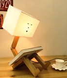 卧室床头创意木头个性台灯北欧宜家简约布艺可折叠实木人形小台灯