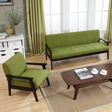 北欧日式沙发复古设计师皮布艺沙发单人双人三人咖啡厅实木沙发椅