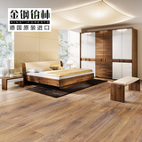 金钢铂林强化复合木地板家用卧室地板家用E0级特价仿古木地板进口