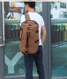 圆筒帆布韩版背包大容量单肩书包男士多功能双肩包旅行水桶行李包