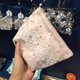 韩国东大门代购甜美蕾丝蝴蝶结镂空花珍珠手包化妆包时尚大容量