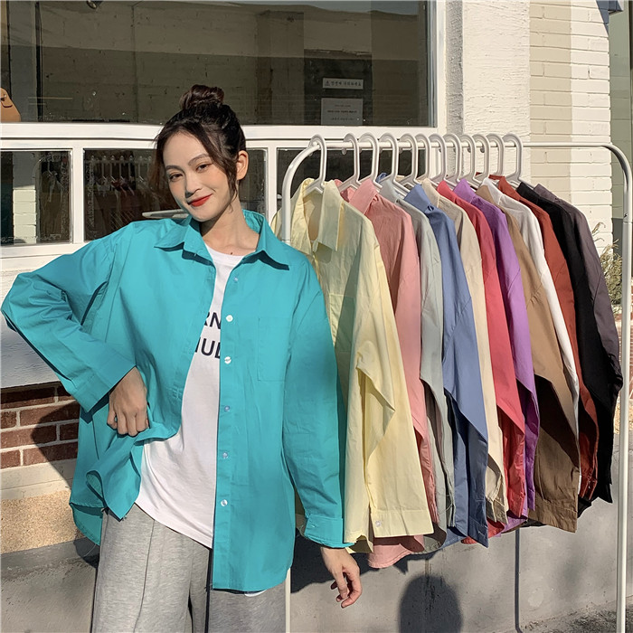 Early Spring 2021 shirt bottomed over a loose-fitting cardigan with a loose salty blue shirt with a niche design