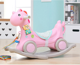 old plastic rocking horse